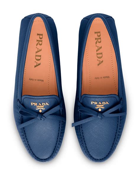 prada bow detail loafers.